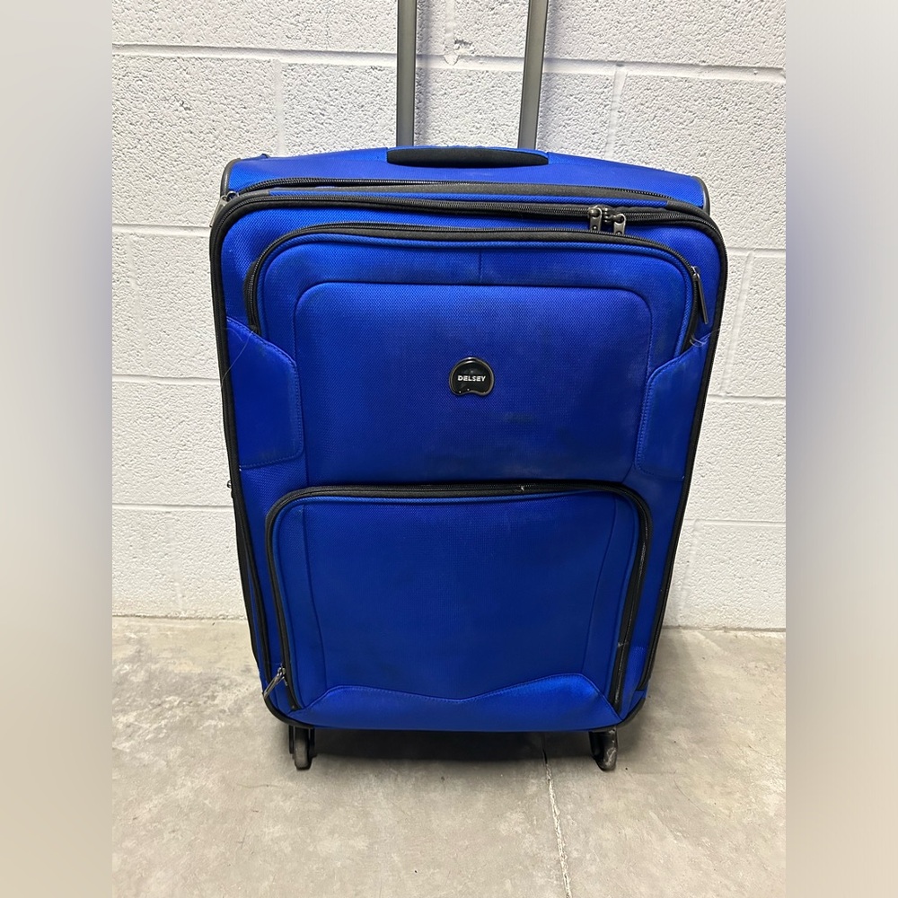 Delsey Blue 360 spin luggage